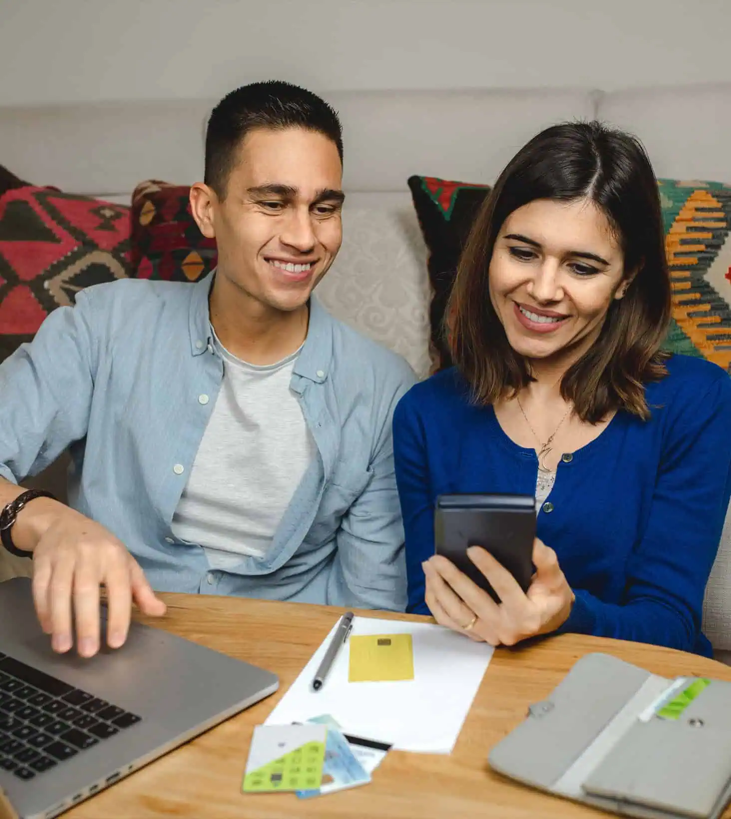 happy-young-caucasian-couple-calculating-family-budget